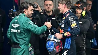 Aston Martin's Spanish driver Fernando Alonso (L) congratulates Red Bull Racing's Dutch driver Max Verstappen after he won his fourth consecutive Formula One world title after the Las Vegas Formula One Grand Prix in Las Vegas, Nevada on November 23, 2024.  
Frederic J. Brown / AFP