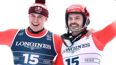 epa11890590 Gold medalists Franjo von Allmen (L) and Loic Meillard of Switzerland pose in the finish area after the Slalom race of the Men's Team Combined event at the FIS Alpine Skiing World Championships in Saalbach Hinterglemm, Austria, 12 February 2025.  EPA/ANNA SZILAGYI