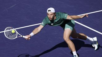 epa11948038 Tallon Griekspoor of the Netherlands in action against Alexander Zverev of Germany during the BNP Paribas Open tennis tournament in Indian Wells, California, USA, 07 March 2025.  EPA/JOHN G. MABANGLO