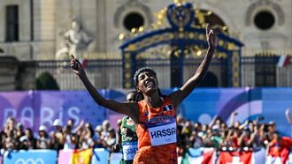 Netherlands' gold medallist Sifan Hassan crosses the finish in first place in the women's marathon of the athletics event at the Paris 2024 Olympic Games at The Invalides in Paris on August 11, 2024. 
Andrej ISAKOVIC / AFP