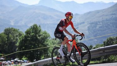 INEOS Grenadiers team's Spanish rider Carlos Rodriguez cycles during the 13th stage of the 112th edition of the Tour de France cycling race, 10.9 km individual time trial  between Loudenvielle and Peyragudes, in the Pyrenees mountains of southwestern France, on July 18, 2025. 
Anne-Christine POUJOULAT / AFP