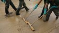 epa11694448 Officers of the INFOCA, a plan aimed to defend the Andalusian mountains against forest fires, clean a mud-covered street in Alora town, Malaga province, Andalusia region, Spain, 31 October 2024. There is no warning for rain or storms in the province of Malaga on 31 October, according to the State Meteorological Agency (AEMET), which reminded that the DANA (high-altitude isolated depression) phenomenon is still over Spain and that the meteorological emergency has not ended. More than 150 people died in the province of Valencia and neighboring provinces following floods caused by the DANA impacting the eastern part of the country.  EPA/JORGE ZAPATA