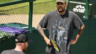 Australia's Nick Kyrgios attends the training session of Serbia's Novak Djokovic, on the Aorangi practice courts on the eleventh day of the 2024 Wimbledon Championships at The All England Lawn Tennis and Croquet Club in Wimbledon, southwest London, on July 11, 2024. 
ANDREJ ISAKOVIC / AFP