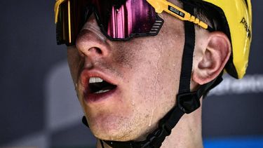 drops of water run down the cheek of UAE Team Emirates team's Slovenian rider Tadej Pogacar after winning the 15th stage of the 111th edition of the Tour de France cycling race, 197,7 km between Loudenvielle and Plateau de Beille, in the Pyrenees mountains, southwestern France, on July 14, 2024. 
Marco BERTORELLO / AFP