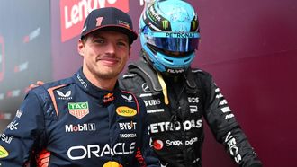 Red Bull Racing's Dutch driver Max Verstappen (L) walks with Mercedes' British driver George Russell after the Sprint Shootout at the Circuit of the Americas in Austin, Texas, on October 21, 2023, ahead of the United States Formula One Grand Prix. 
Chandan Khanna / AFP