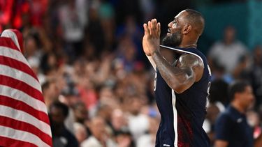 USA's #06 LeBron James celebrates after the USA won the men's Gold Medal basketball match between France and USA during the Paris 2024 Olympic Games at the Bercy  Arena in Paris on August 10, 2024. 
Aris MESSINIS / AFP
