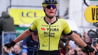 Team Visma-Lease a Bike's Dutch cyclist Olav Kooij celebrates as he crosses the finish line to win the 1st stage of the Paris-Nice cycling race, 158 km between Les Mureaux and Les Mureaux, on March 3, 2024. 
Thomas SAMSON / AFP