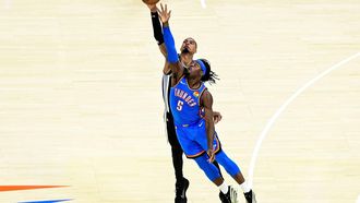 epa13005908 Oklahoma City Thunder guard Luguentz Dort (front) goes for the free ball against San Antonio Spurs forward/center Victor Wembanyama (back) during game 7 of the NBA West Conference Finals between Oklahoma City Thunder and San Antonio Spurs in Oklahoma City, Oklahoma, USA, 30 May 2026.  EPA/GERALD LEONG SHUTTERSTOCK OUT
