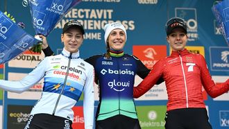 (From L) second-placed Dutch rider Inge van der Heijden, first-placed winner Dutch rider  Lucinda Brand and third-placed Dutch rider Aniek Van Alphen celebrate on the podium after competing in the women's elite race of the 'Flandriencross' cyclocross cycling event, stage 3 of 8 in the 'X20 Badkamers Trofee' competition, in Hamme, on November 16, 2025. 
DAVID PINTENS / Belga / AFP