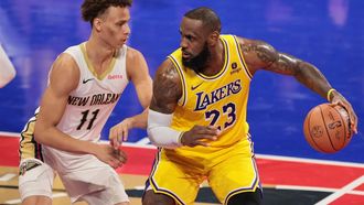 epa11016658 Los Angeles Lakers forward LeBron James (R) in action against New Orleans Pelicans center Jaxson Hayes (L) during the second quarter of the NBA In-Season Tournament West semifinal game between the New Orleans Pelicans and the Los Angeles Lakers at T-Mobile Arena in Las Vegas, Nevada, USA, 07 December 2023. The In-Season Tournament was created to provide players and teams with another competition to win, engage fans in a new way, and drive additional interest in the early portion of the NBA regular-season.  EPA/ALLISON DINNER  SHUTTERSTOCK OUT