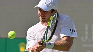 Netherlands's Botic van de Zandschulp hits a return to Spain's Rafael Jodar during their men's singles match at the Shanghai Masters tennis tournament in Shanghai on October 14, 2026. 
Hector RETAMAL / AFP