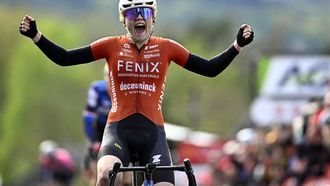 Fenix-Deceuninck team's Dutch rider Puck Pieterse celebrates after winning the women's 