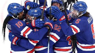 epa12759402 Hilary Knight (2L) of USA celebrates with teammates after scoring the 1-1 during the Women's Ice Hockey gold medal match between the USA and Canada at the Milano Cortina 2026 Winter Olympic Games, in Milan, Italy, 19 February 2026.  EPA/FAZRY ISMAIL