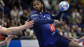 France's Benoit Kounkoud vies for the ball during the men's EURO 2024 EHF Handball European Championship match Group A Switzerland v France in Berlin on January 14, 2024. 
Odd ANDERSEN / AFP