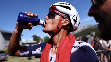 UAE Team Emirates XRG's Mexican rider Isaac Del Toro Romero hydrates after winning the 8th and final stage of the Tour Auvergne-Rhone-Alpes cycling race (formerly known as the Criterium du Dauphine), 120,1km between Beaufort and Plateau de Solaison, in the French Alps on June 14, 2026. 
Anne-Christine POUJOULAT / AFP