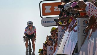 Canyon//SRAM zondacrypto's Polish rider Katarzyna Niewiadoma celebrates as she crosses the finish line to win the 7th (out of 9) stage of the fifth edition of the Women's Tour de France cycling race, 146.8 km from Voulte-sur-Rhone to The Mont Ventoux, at The Mont Ventoux, southeastern France on August 7, 2026. 
NICOLAS TUCAT / AFP