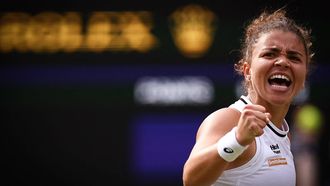 Italy's Jasmine Paolini celebrates winning a point in the third set against Croatia's Donna Vekic during their women's singles semi-final tennis match on the eleventh day of the 2024 Wimbledon Championships at The All England Lawn Tennis and Croquet Club in Wimbledon, southwest London, on July 11, 2024. 
HENRY NICHOLLS / AFP