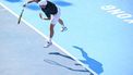 Netherlands' Botic Van De Zandschulp hits a return against China’s Shang Juncheng during their men's singles match at the Hong Kong Open tennis tournament in Hong Kong on January 3, 2024. 
Peter PARKS / AFP