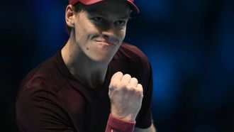 Italy's Jannik Sinner reacts during his match against Canada's Felix Auger-Aliassime at the ATP Finals tennis tournament in Turin on November 10, 2025. 
Marco BERTORELLO / AFP