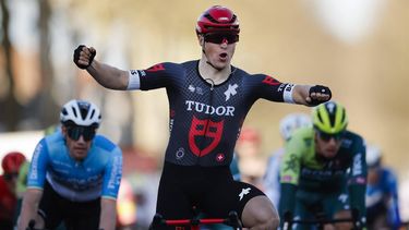 epa11198850 Dutch rider Arvid De Kleijn (C) of Tudor Pro Cycling Team celebrates crossing the finish line to win the 2nd stage of the Paris Nice cycling race over 179 km from Thoiry to Montargis, France, 04 March 2024.  EPA/YOAN VALAT