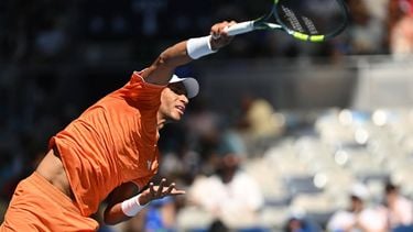epa12660169 Felix Auger-Aliassime of Canada serves against Nuno Borges of Portugal during their men's singles first round match on day 2 of the 2026 Australian Open tennis tournament at Jon Cain Arena at Melbourne Park in Melbourne, Australia, 19 January 2026.  EPA/LUKAS COCH AUSTRALIA AND NEW ZEALAND OUT
