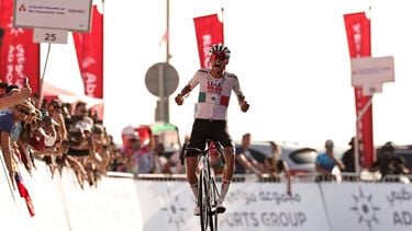 UAE Team Emirates's Mexican rider Isaac Del Toro Romero reacts after finishing first place in the sixth stage of the UAE Tour cycling event from al-Ain Museum to Jebel Hafeet in Abu Dhabi on February 21, 2026. 
Fadel SENNA / AFP