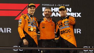 epa12030249 (L-R) First-placed McLaren driver Oscar Piastri of Australia ,McLaren team principal Andrea Stella and third-placed McLaren driver Lando Norris of Britain celebrate on the podium after the Formula One Bahrain Grand Prix in Sakhir, Bahrain, 13 April 2025.  EPA/ALI HAIDER