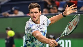 2023-10-15 11:31:46 Poland's Hubert Hurkacz hits a return against Russia's Andrey Rublev during their men's singles final match at the Shanghai Masters tennis tournament in Shanghai on October 15, 2023. 
Hector RETAMAL / AFP