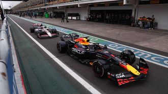 Red Bull Racing's Dutch driver Max Verstappen (R) and Haas F1 Team's French driver Esteban Ocon (L) line up in the pit lane ahead of the Sao Paulo Formula One Grand Prix at the Jose Carlos Pace racetrack, aka Interlagos, in Sao Paulo, Brazil on November 9, 2025. 
JEAN CARNIEL / POOL / AFP