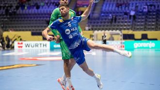 epa12653909 Slovenia's Blaz Janc in action during the Men's EHF EURO 2026 handball match between Slovenia and Montenegro, in Baerum, Norway, 16 January 2026.  EPA/Cornelius Poppe  NORWAY OUT