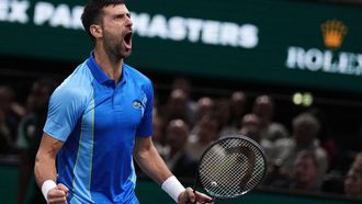 2023-11-03 21:36:45 Serbia's Novak Djokovic reacts after winning a game during his men's singles quarter-final match against Denmark's Holger Rune on day five of the Paris ATP Masters 1000 tennis tournament at the Accor Arena - Palais Omnisports de Paris-Bercy - in Paris on November 3, 2023. 
Dimitar DILKOFF / AFP