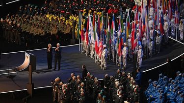 President of the International Olympic Committee (IOC) Kirsty Coventry (L) applauds next to President of the Organising Committee for the 2026 Olympic and Paralympic Winter Games Giovanni Malago (2nd L) during the opening ceremony of the Milano Cortina 2026 Winter Olympic Games at the San Siro stadium in Milan, northern Italy, on February 6, 2026. 
Gabriel BOUYS / AFP