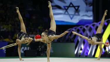 epa12320561 Gymnasts of team Israel compete in the hoop and ball category at the World Rhythmic Gymnastics Championships in Rio de Janeiro, Brazil, 24 August 2025.  EPA/Antonio Lacerda