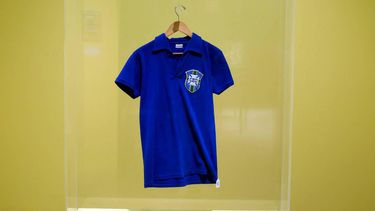 The jersey worn by Brazilian football legend Pele during the 1958 FIFA World Cup final match against Sweden is exhibited during a press preview at the Sotheby's Breuer building in New York, on July 1, 2026. The shirt will be put to auction as part of the 