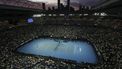 epa11091447 Linda Noskova (C-R) of the Czech Republic in action during the Women's 3rd round match against Iga Swiatek (C-L) of Poland during a sunset at the Australian Open tennis tournament in Melbourne, Australia, 20 January 2024.  EPA/MAST IRHAM