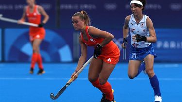 Netherlands' forward #16 Joosje Burg is marked by Japan's defender #37 Rika Ogawa in the women's pool A field hockey match between the Netherlands and Japan during the Paris 2024 Olympic Games at the Yves-du-Manoir Stadium in Colombes on August 3, 2024. 
Ahmad GHARABLI / AFP