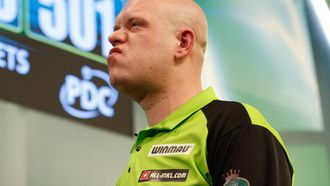 epa11052599 Michael van Gerwen of the Netherlands reacts during the Paddy Power World Darts Championship at Alexandra Palace in London, Britain, 01 January 2024.  EPA/DAVID CLIFF