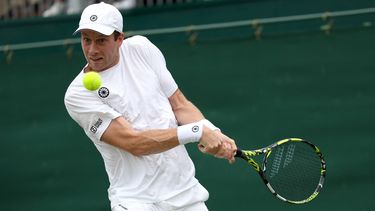 epa11450293 Botic van de Zandschulp of the Netherlands in action during the Men's 1st round match against Liam Broady of Britain at the Wimbledon Championships, Wimbledon, Britain, 01 July 2024.  EPA/TIM IRELAND  EDITORIAL USE ONLY