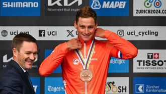 Third-placed Netherlands' Mathieu van der Poel celebrates during the podium ceremony of the men's Elite Road Race cycling event as part of the UCI 2024 Road World Championships, in Zurich, on September 29, 2024. 
Fabrice COFFRINI / AFP