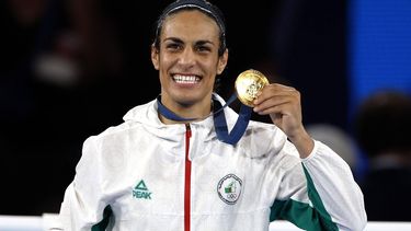 epa11541370 Gold medal winner Imane Khelif of Algeria poses on the podium of the Women's 66kg Final category of the Boxing competitions in the Paris 2024 Olympic Games, at Roland Garros in Paris, France, 09 August 2024.  EPA/MAST IRHAM