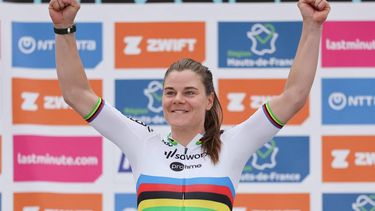 Team SD Worx - Protime's Belgian rider Lotte Kopecky celebrates on the podium after winning the fourth edition of the women's Paris-Roubaix one-day classic cycling race, 148,5km between Denain and Roubaix, on April 6, 2024. 
Francois LO PRESTI / AFP