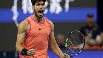 epa11634950 Carlos Alcaraz of Spain celebrates winning his Men's Singles semifinal match against Daniil Medvedev of Russia at the China Open tennis tournament in Beijing, China, 01 October 2024.  EPA/ANDRES MARTINEZ CASARES