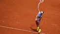 Poland's Iga Swiatek serves to Slovakia’s Rebecca Sramkova during their women's singles match on day 2 of the French Open tennis tournament on Court Philippe-Chatrier at the Roland-Garros Complex in Paris on May 26, 2025. 
Dimitar DILKOFF / AFP