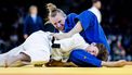 PARIJS - Judoka Julie Beurskens in actie tegen de Duitse Pauline Starke in de categorie vrouwen tot 57 kilogram van het judotoernooi op de Olympische Spelen in Frankrijk. ANP REMKO DE WAAL