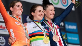 Gold medallist Australia's Grace Brown (C), silver medallist Netherlands' Demi Vollering (L) and bronze medallist (R) US' Chloe Dygert pose on the podium of the women's Elite Individual Time Trial cycling event, 29,9km from Gossau to Zurich, during the UCI 2024 Road World Championships, near Meilen, on September 22, 2024. 
Alex WHITEHEAD / POOL / AFP