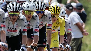 epa12235458 Slovenian rider Tadej Pogacar (R) of UAE Team Emirates in action during the 9th stage of the Tour de France cycling race over 174.1km from Chinon to Chateauroux, France, 13 July 2025.  EPA/CHRISTOPHE PETIT TESSON