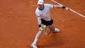 epa12052087 Botic Van de Zandschulp of the Netherlands in action against Jan-Lennard Struff of Germany during their first round match at the Madrid Open tennnis tournament in Madrid, Spain, 24 April 2025.  EPA/JUANJO MARTIN