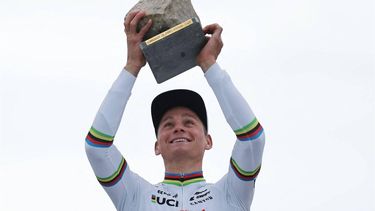 Alpecin - Deceuninck team's Dutch rider Mathieu Van Der Poel celebrates on the podium after winning the 121st edition of the Paris-Roubaix one-day classic cycling race, 260km between Compiegne and Roubaix, northern France, on April 7, 2024. 
Francois LO PRESTI / AFP