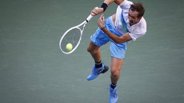 Russia's Daniil Medvedev hits a return to Portugal's Nuno Borges during their men's singles round of 16 match on day eight of the US Open tennis tournament at the USTA Billie Jean King National Tennis Center in New York City, on September 2, 2024. 
KENA BETANCUR / AFP