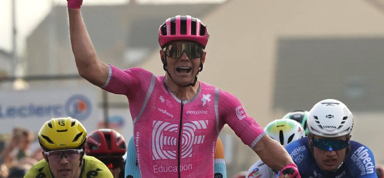 EF Education - EasyPost's US rider Luke Lamperti celebrates as he crosses the finish line to win the 1st stage of the Paris-Nice cycling race, 170.9 km between Achères and Carrières-sous-Poissy, on March 8, 2026. 
Anne-Christine POUJOULAT / AFP